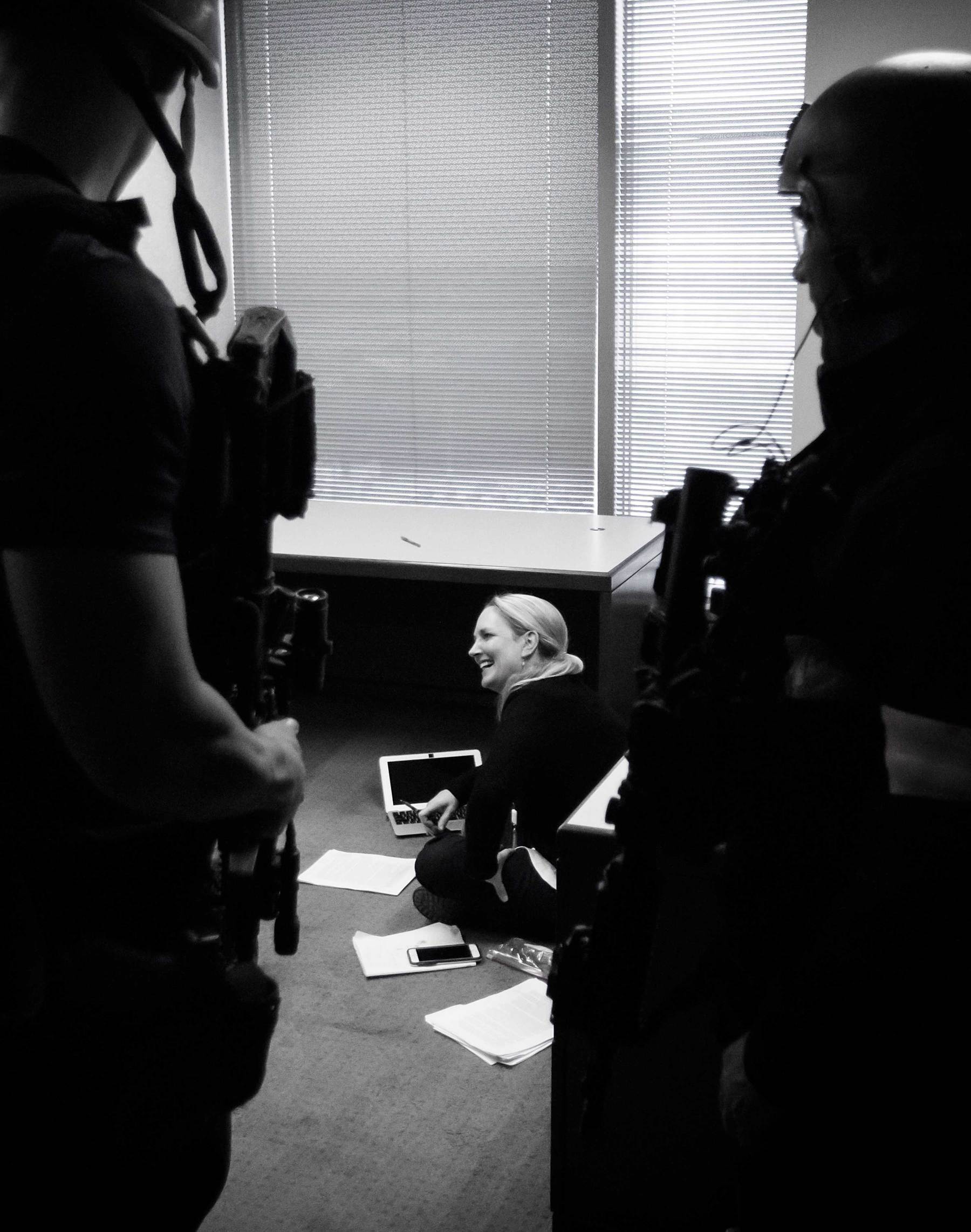 Author Jamie Thompson with members of the Dallas SWAT team.